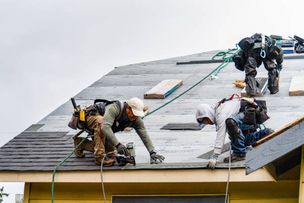Professional Roofing technician working in Yukon, PA